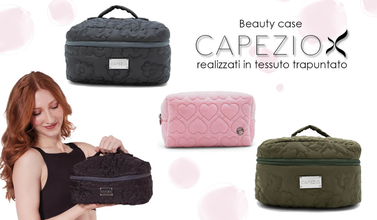Beauty case Capezio in tessuto trapuntato disponibile in nero, rosa e verde, con manico e zip